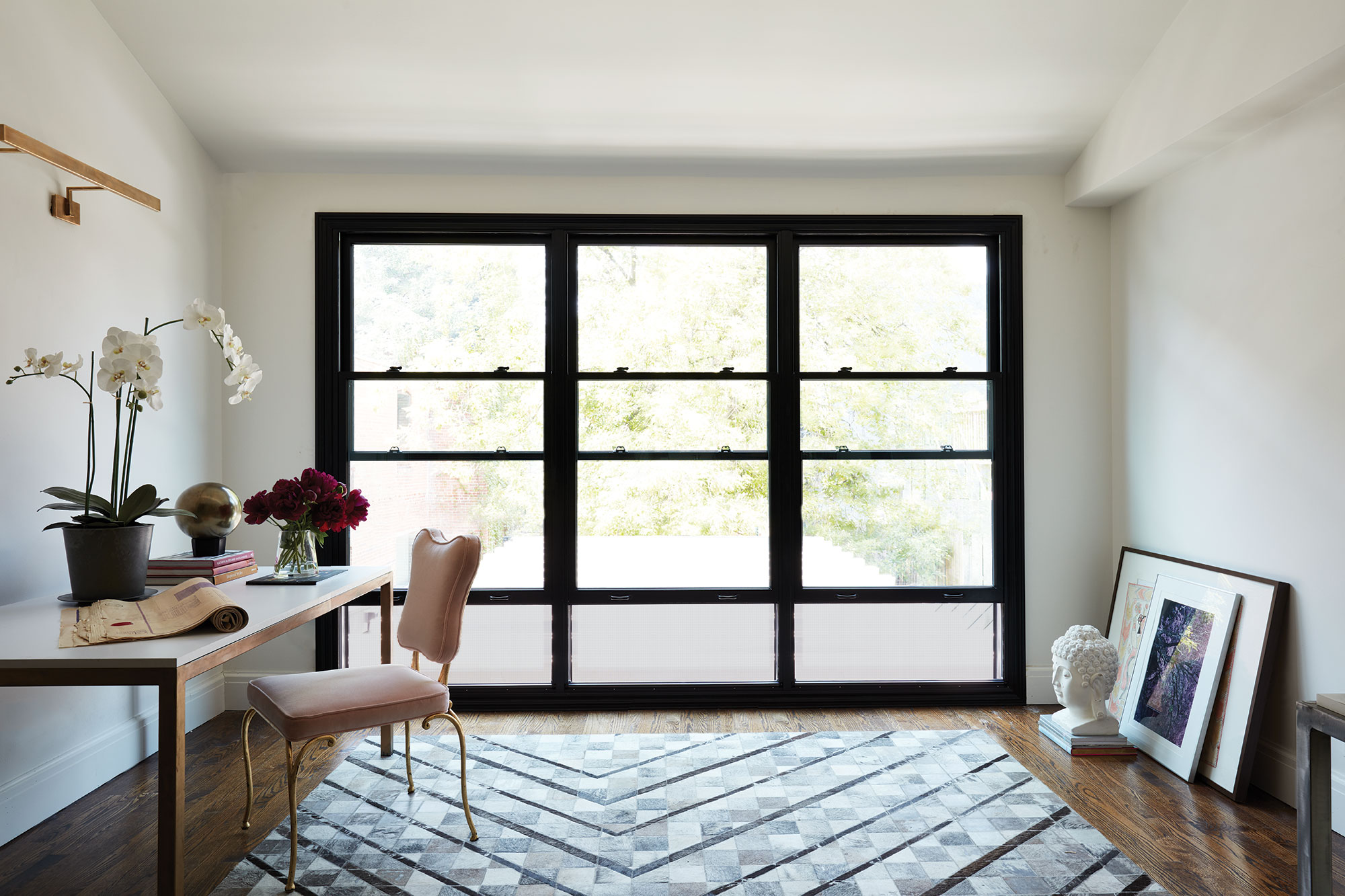 Black single-hung windows in modern office